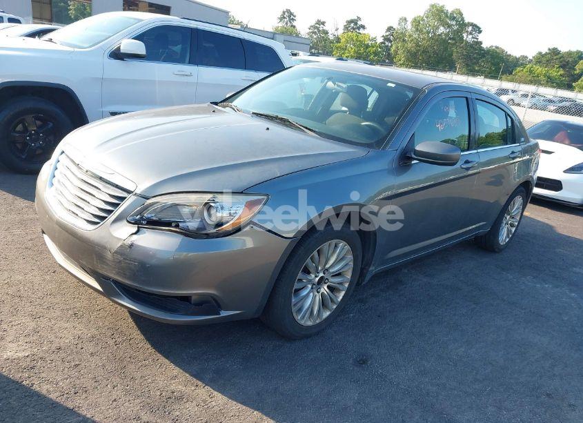 Photo 2 of 2013 Chrysler 200 LX (VIN 1C3CCBAB0DN671813)