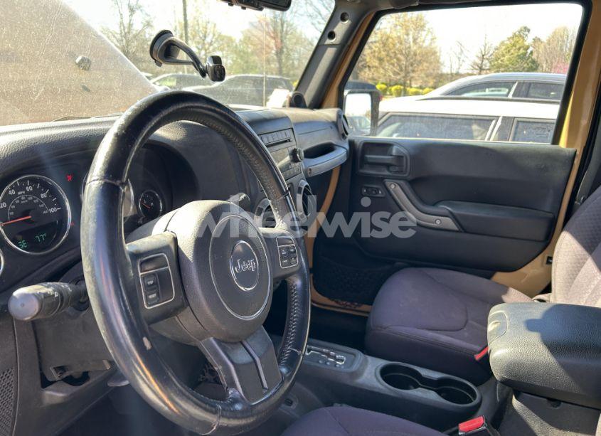 Photo 5 of 2013 Jeep Wrangler (VIN 1C4AJWAG1DL687817)