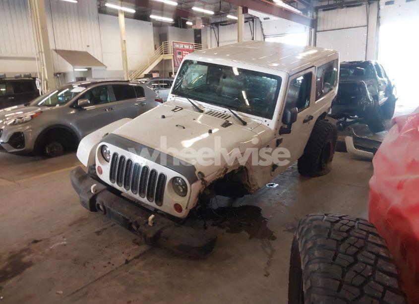 Photo 2 of 2012 Jeep Wrangler SAHARA (VIN 1C4AJWBG9CL233232)
