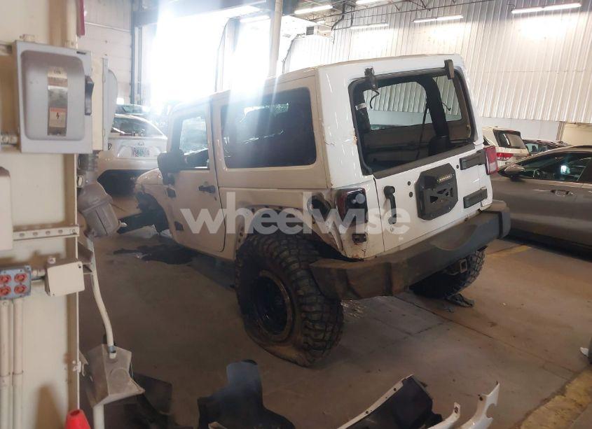 Photo 3 of 2012 Jeep Wrangler SAHARA (VIN 1C4AJWBG9CL233232)