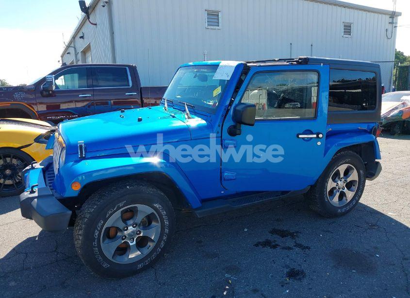 Photo 2 of 2016 Jeep Wrangler SAHARA (VIN 1C4AJWBGXGL128530)