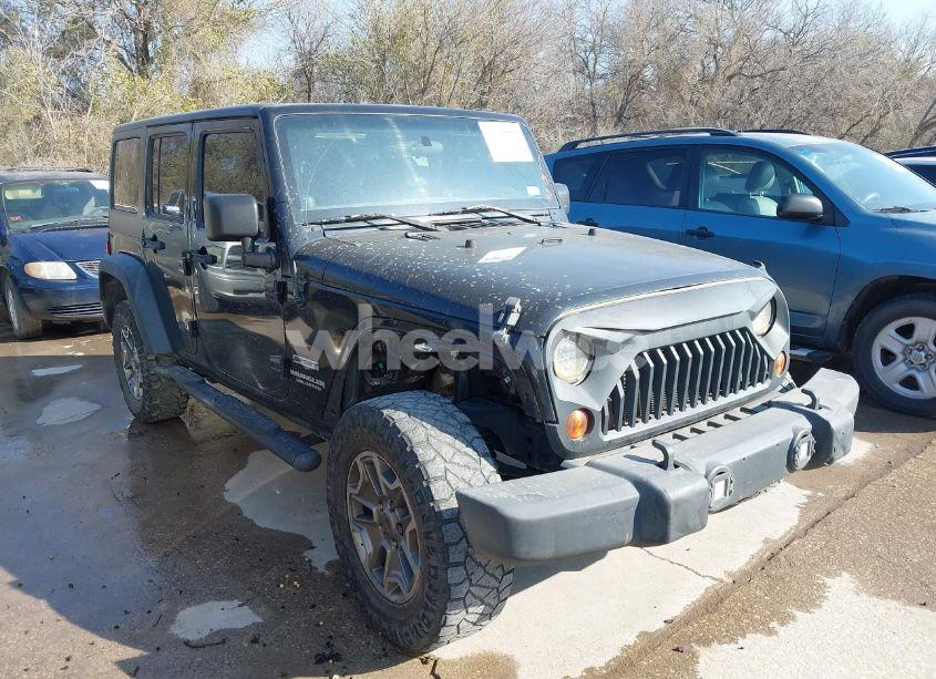 2012 Jeep Wrangler UNLIMITED SPORT (VIN 1C4BJWDG0CL214750) main photo