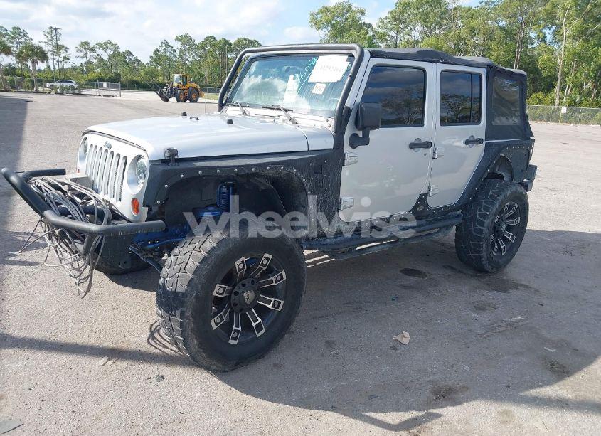 Photo 2 of 2012 Jeep Wrangler UNLIMITED SPORT (VIN 1C4BJWDG0CL216983)