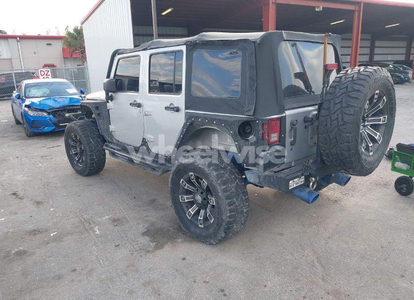 Photo 3 of 2012 Jeep Wrangler UNLIMITED SPORT (VIN 1C4BJWDG0CL216983)