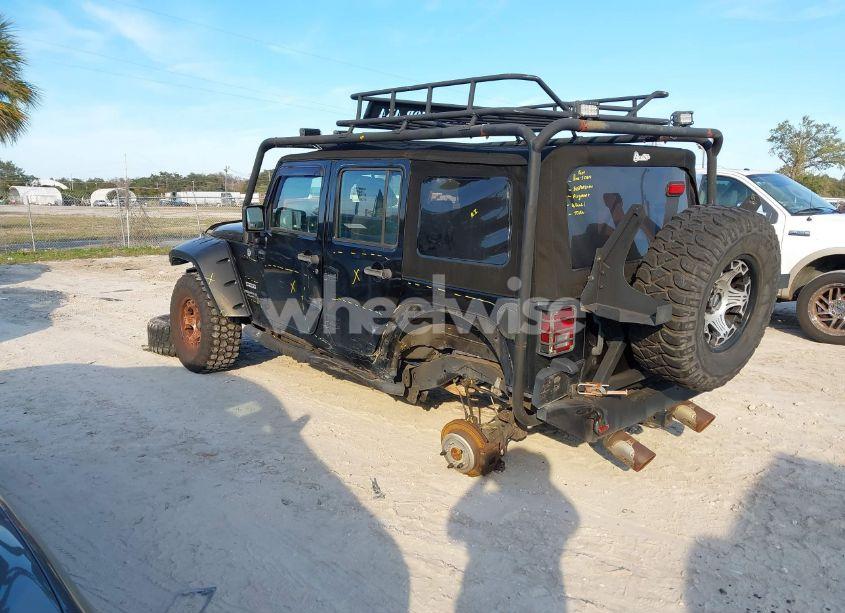 Photo 3 of 2013 Jeep Wrangler UNLIMITED SPORT (VIN 1C4BJWDG0DL593086)