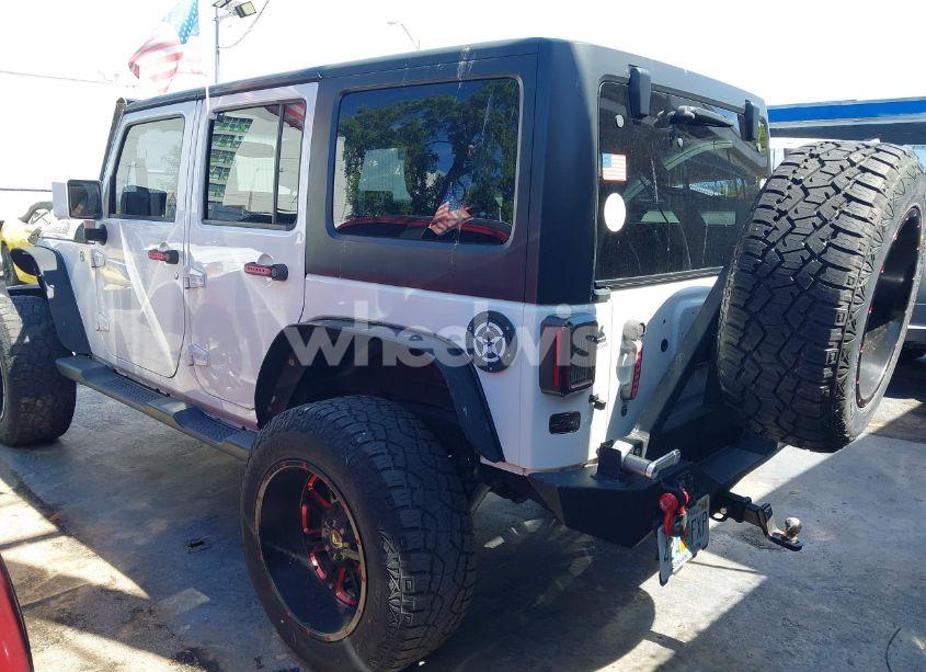 Photo 3 of 2015 Jeep Wrangler UNLIMITED SPORT (VIN 1C4BJWDG0FL664242)