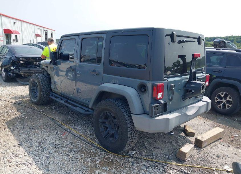 Photo 3 of 2014 Jeep Wrangler UNLIMITED SPORT (VIN 1C4BJWDG1EL305223)