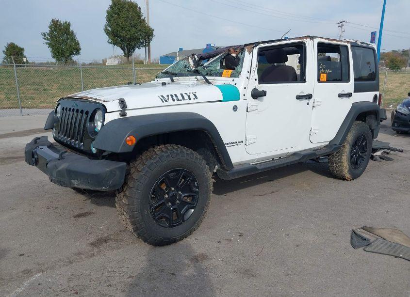 Photo 2 of 2014 Jeep Wrangler UNLIMITED WILLYS WHEELER (VIN 1C4BJWDG1EL327271)