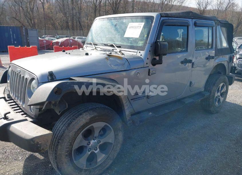 Photo 2 of 2016 Jeep Wrangler UNLIMITED SPORT (VIN 1C4BJWDG1GL311302)