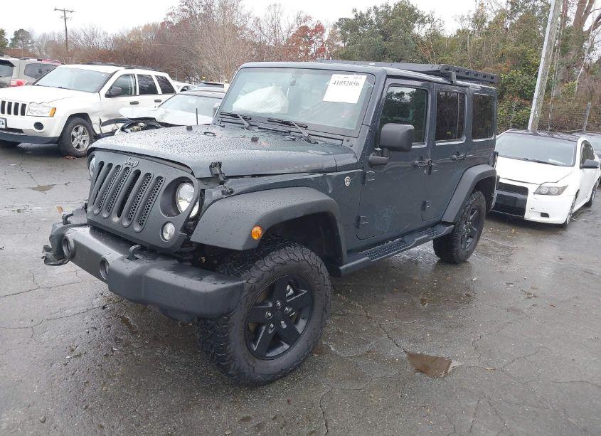 Photo 2 of 2017 Jeep Wrangler UNLIMITED BIG BEAR 4X4 (VIN 1C4BJWDG1HL666391)