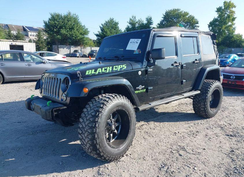 Photo 2 of 2014 Jeep Wrangler UNLIMITED FREEDOM EDITION (VIN 1C4BJWDG2EL235831)