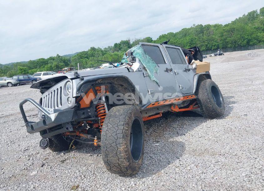 Photo 2 of 2015 Jeep Wrangler UNLIMITED SPORT (VIN 1C4BJWDG3FL682296)
