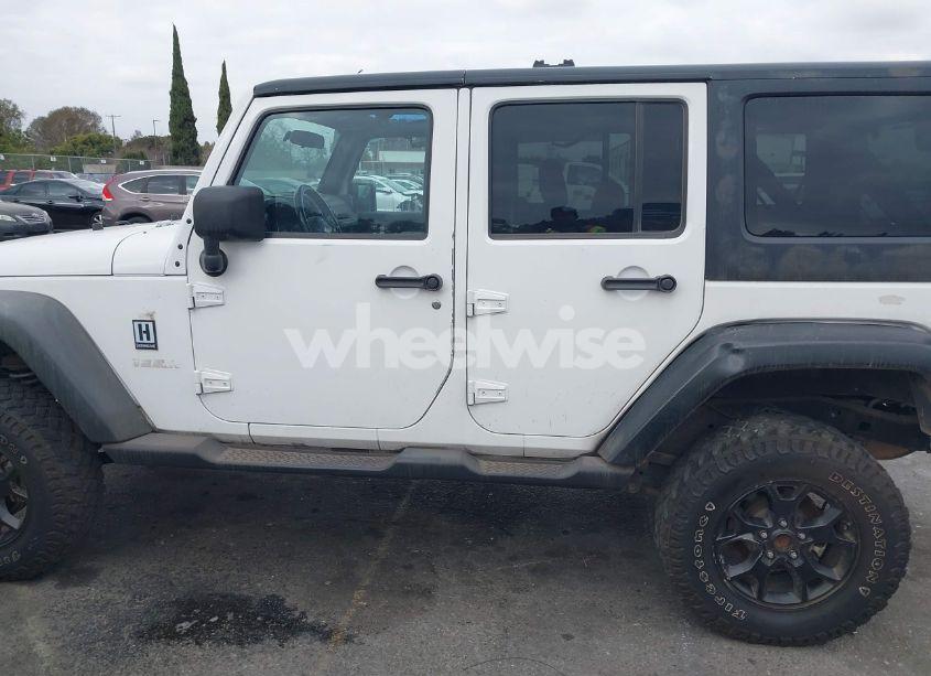Photo 14 of 2012 Jeep Wrangler UNLIMITED SPORT (VIN 1C4BJWDG4CL109807)