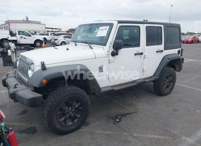 Photo 2 of 2012 Jeep Wrangler UNLIMITED SPORT (VIN 1C4BJWDG4CL109807)