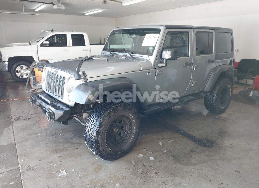 Photo 2 of 2014 Jeep Wrangler UNLIMITED SPORT (VIN 1C4BJWDG4EL156774)