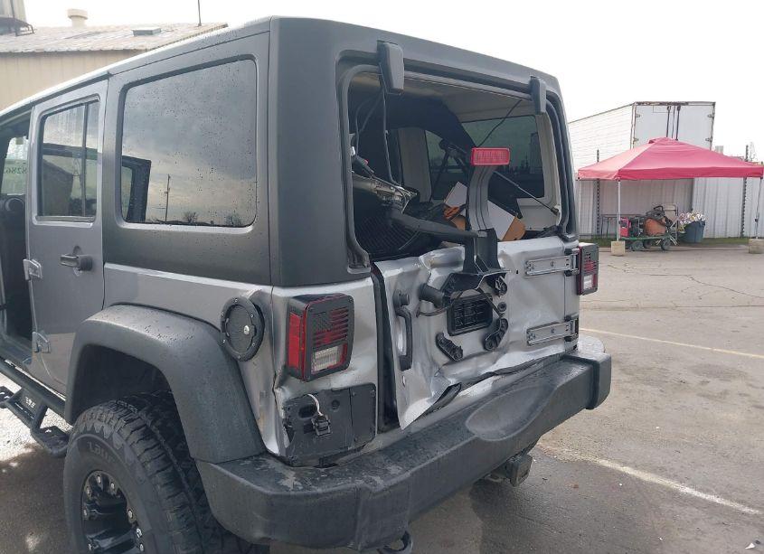 Photo 6 of 2015 Jeep Wrangler UNLIMITED SPORT (VIN 1C4BJWDG4FL557193)