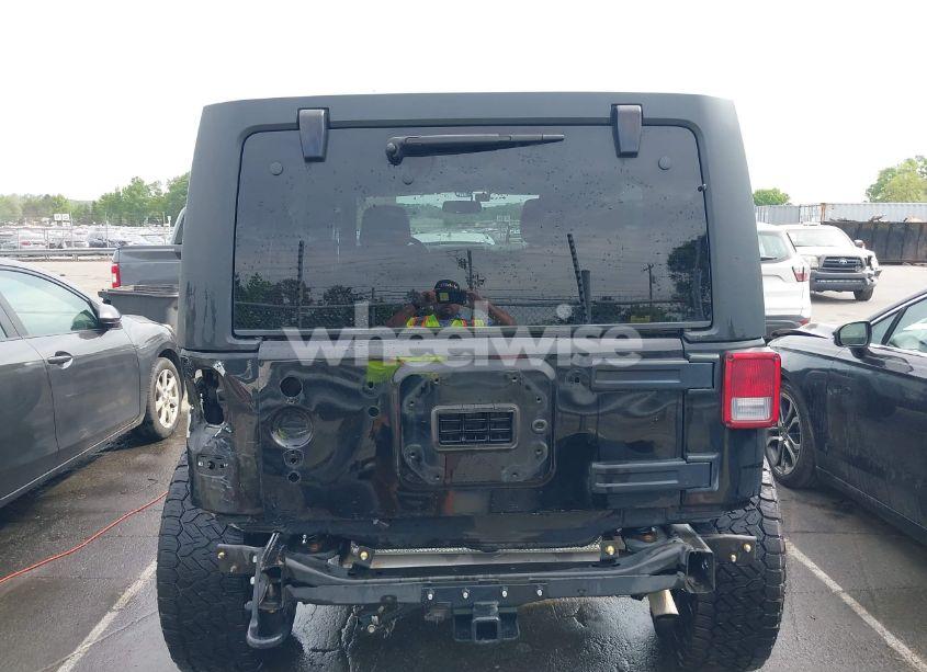Photo 6 of 2015 Jeep Wrangler UNLIMITED SPORT (VIN 1C4BJWDG4FL687829)