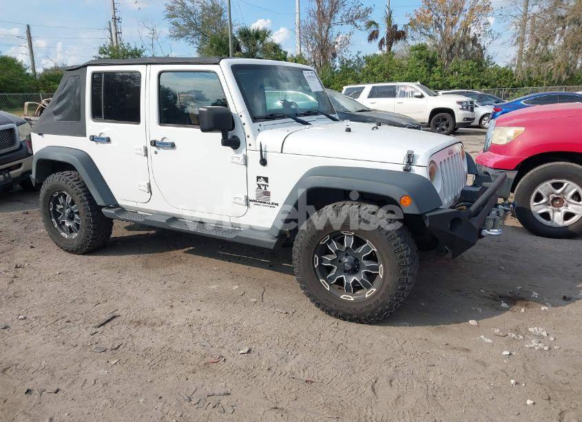 2012 Jeep Wrangler UNLIMITED SPORT (VIN 1C4BJWDG5CL283837) main photo