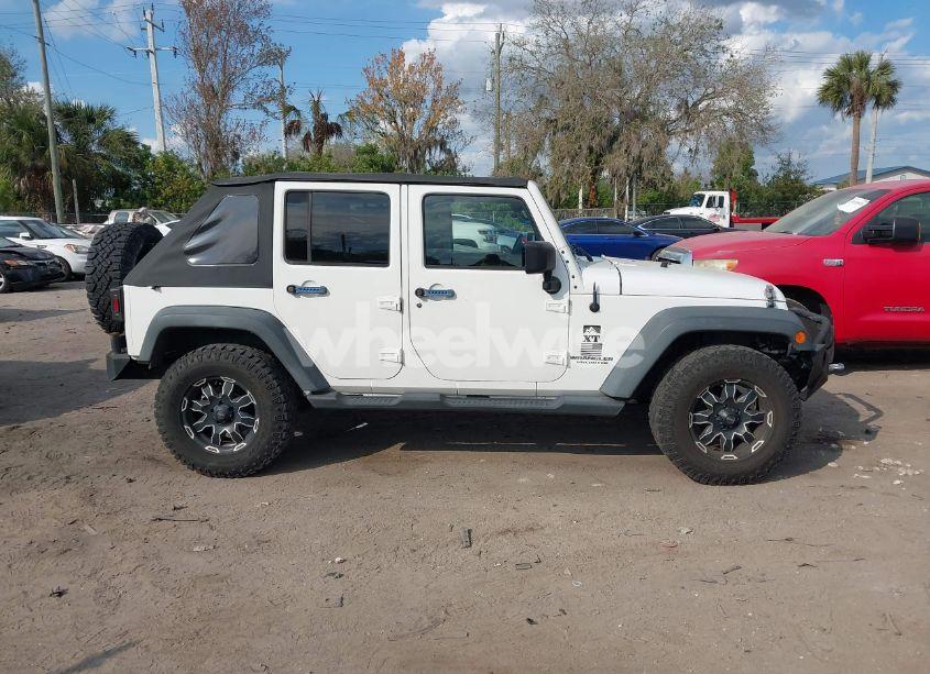 Photo 13 of 2012 Jeep Wrangler UNLIMITED SPORT (VIN 1C4BJWDG5CL283837)