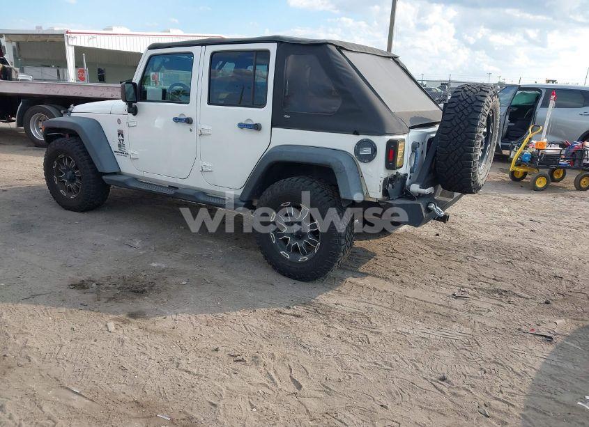 Photo 3 of 2012 Jeep Wrangler UNLIMITED SPORT (VIN 1C4BJWDG5CL283837)