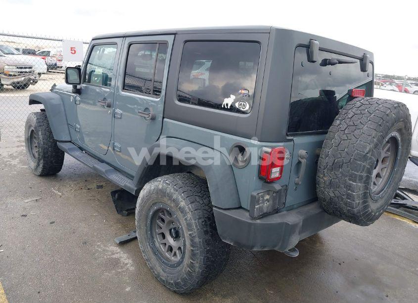 Photo 3 of 2014 Jeep Wrangler UNLIMITED SPORT (VIN 1C4BJWDG5EL319545)