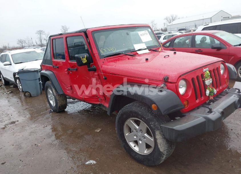 2012 Jeep Wrangler UNLIMITED SPORT (VIN 1C4BJWDG7CL214454) main photo