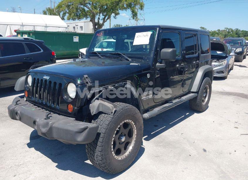 Photo 2 of 2013 Jeep Wrangler UNLIMITED SPORT (VIN 1C4BJWDG7DL583686)