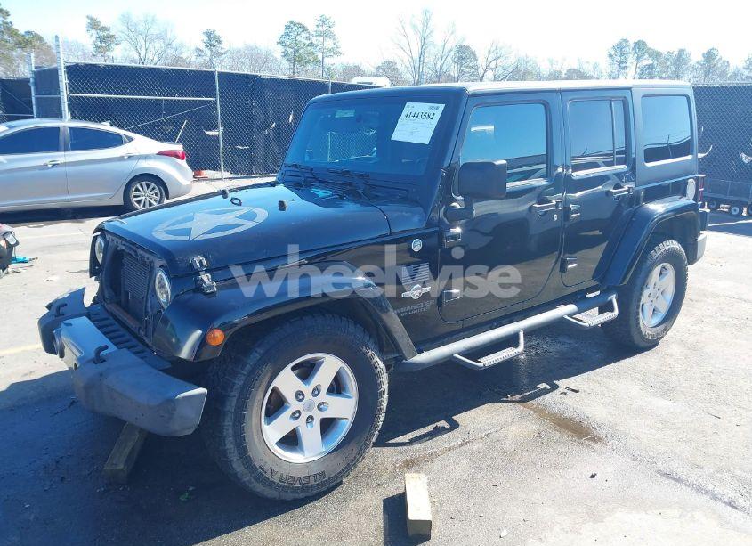 Photo 2 of 2014 Jeep Wrangler UNLIMITED FREEDOM EDITION (VIN 1C4BJWDG8EL179491)