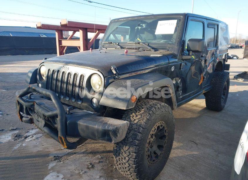 Photo 2 of 2017 Jeep Wrangler UNLIMITED BIG BEAR 4X4 (VIN 1C4BJWDG8HL695760)