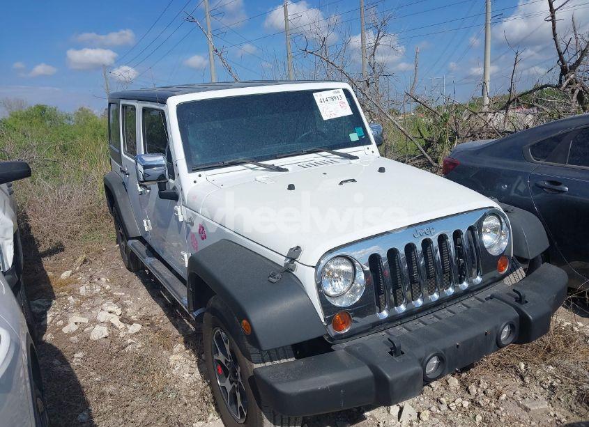 2012 Jeep Wrangler UNLIMITED SPORT (VIN 1C4BJWDG9CL111827) main photo