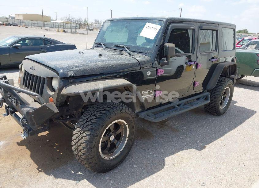 Photo 2 of 2013 Jeep Wrangler UNLIMITED SPORT (VIN 1C4BJWDG9DL569109)