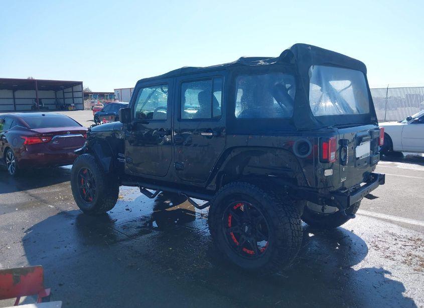 Photo 3 of 2015 Jeep Wrangler UNLIMITED SPORT (VIN 1C4BJWDG9FL641042)