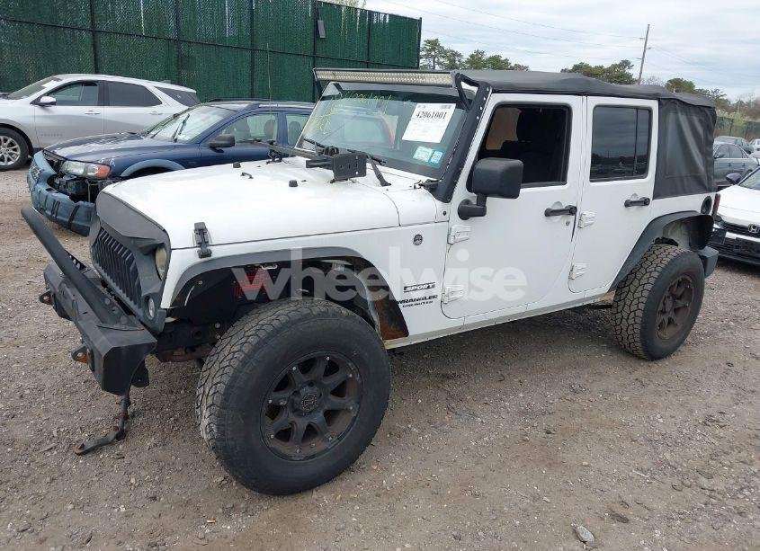 Photo 2 of 2017 Jeep Wrangler UNLIMITED SPORT 4X4 (VIN 1C4BJWDG9HL671323)