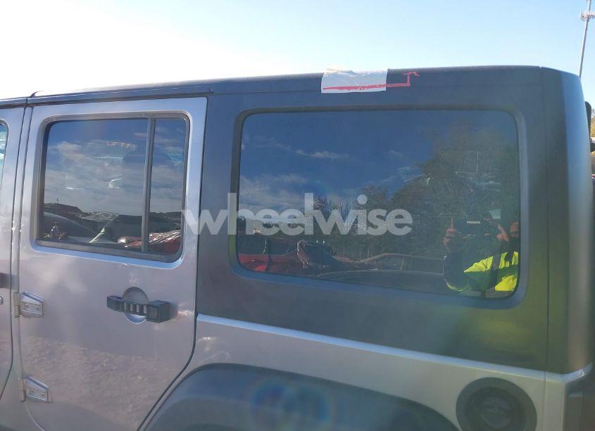 Photo 12 of 2018 Jeep Wrangler JK UNLIMITED SPORT S 4X4 (VIN 1C4BJWDG9JL860379)