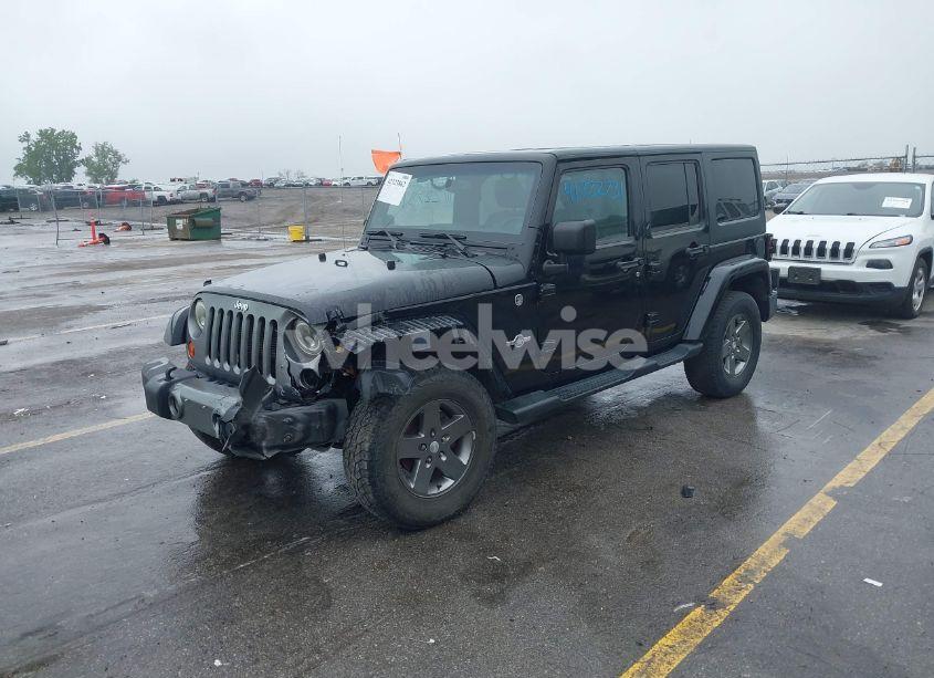 Photo 2 of 2013 Jeep Wrangler UNLIMITED FREEDOM EDITION (VIN 1C4BJWDGXDL596450)