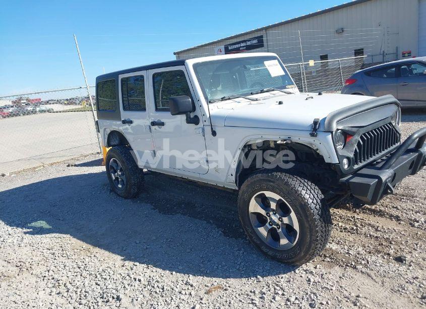 2014 Jeep Wrangler UNLIMITED WILLYS WHEELER (VIN 1C4BJWDGXEL245698) main photo