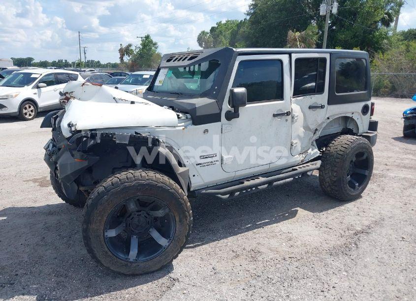 Photo 2 of 2016 Jeep Wrangler UNLIMITED SPORT (VIN 1C4BJWDGXGL335825)