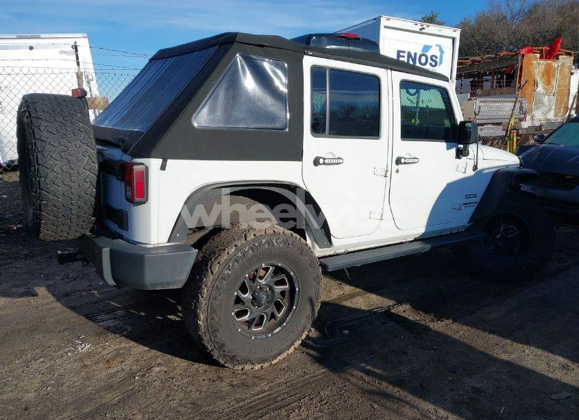 Photo 4 of 2017 Jeep Wrangler UNLIMITED SPORT 4X4 (VIN 1C4BJWDGXHL562045)