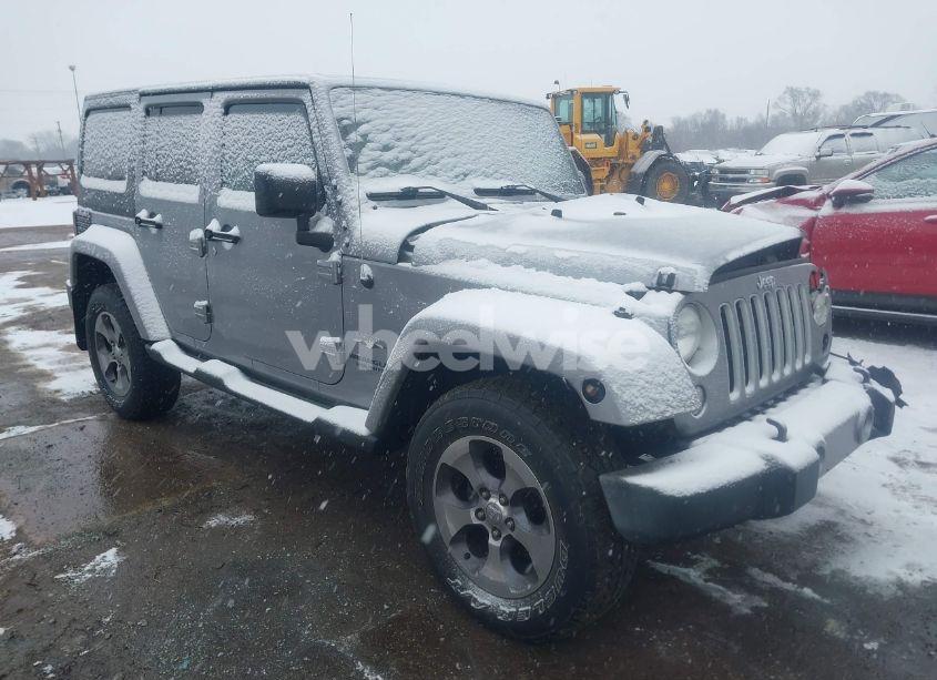 2016 Jeep Wrangler UNLIMITED SAHARA (VIN 1C4BJWEG0GL158586) main photo