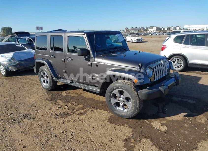 2017 Jeep Wrangler UNLIMITED SAHARA 4X4 (VIN 1C4BJWEG0HL558195) main photo