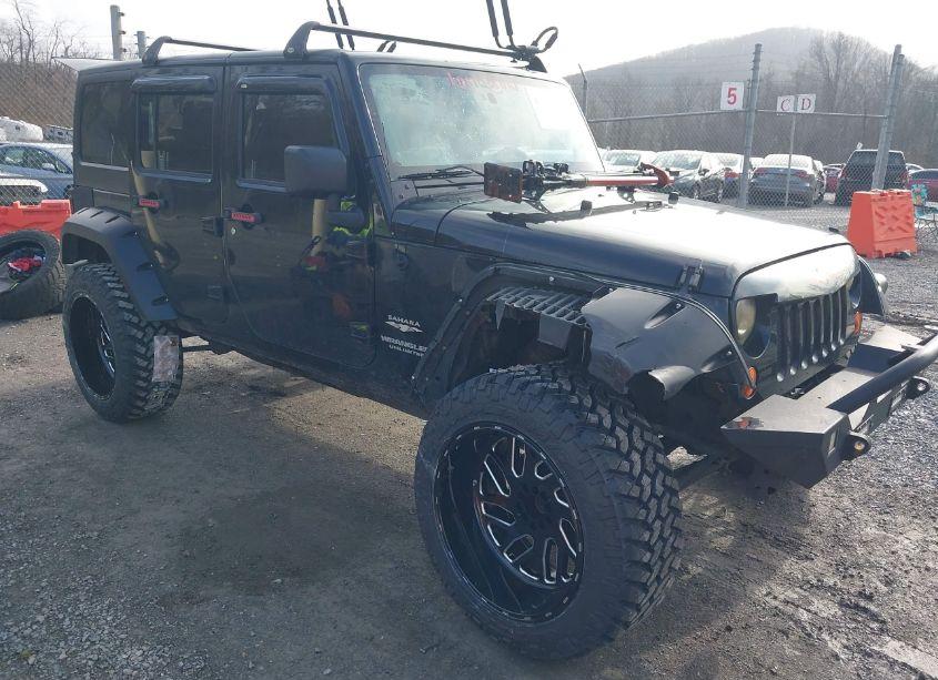 2012 Jeep Wrangler UNLIMITED SAHARA (VIN 1C4BJWEG2CL183497) main photo