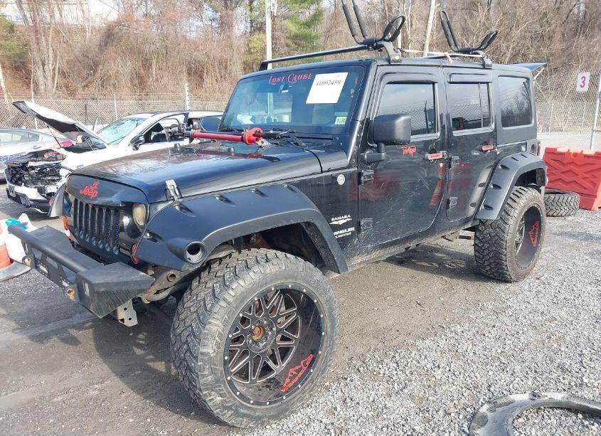 Photo 2 of 2012 Jeep Wrangler UNLIMITED SAHARA (VIN 1C4BJWEG2CL183497)