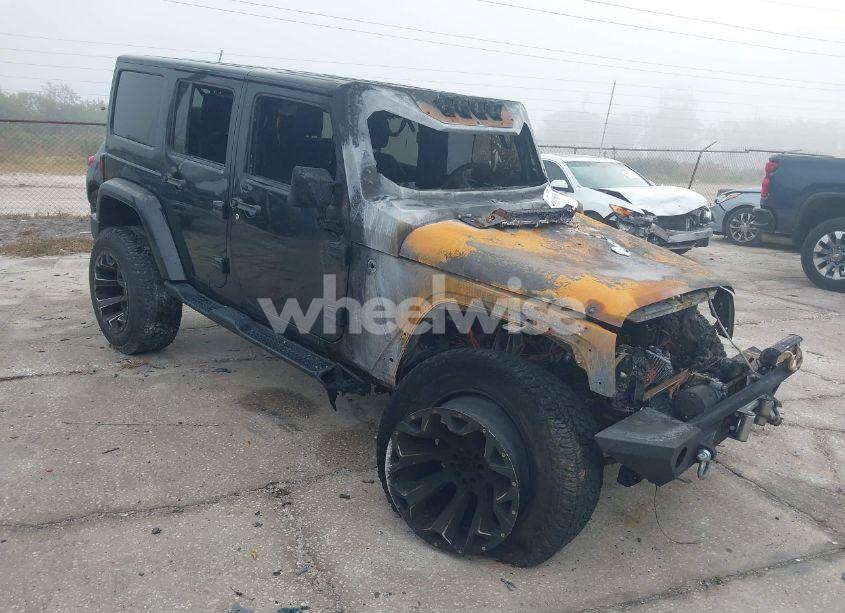 2016 Jeep Wrangler UNLIMITED SAHARA (VIN 1C4BJWEG9GL213388) main photo