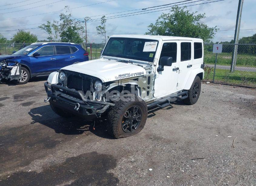 Photo 2 of 2017 Jeep Wrangler UNLIMITED SMOKY MOUNTAIN 4X4 (VIN 1C4BJWEG9HL708837)