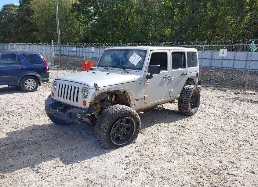 Photo 2 of 2012 Jeep Wrangler UNLIMITED SAHARA (VIN 1C4BJWEGXCL177561)