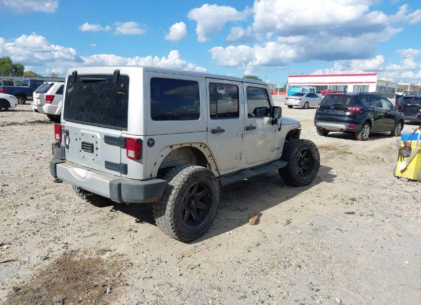 Photo 4 of 2012 Jeep Wrangler UNLIMITED SAHARA (VIN 1C4BJWEGXCL177561)