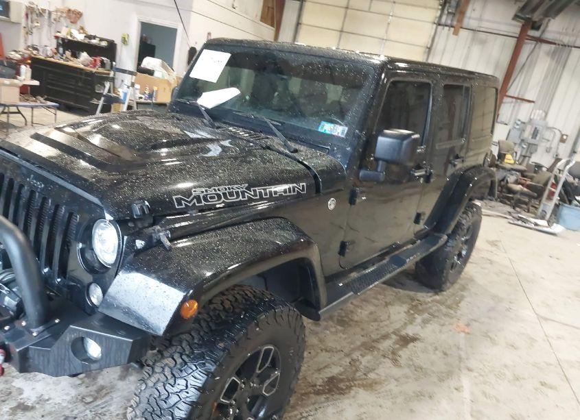 Photo 2 of 2017 Jeep Wrangler UNLIMITED SMOKY MOUNTAIN 4X4 (VIN 1C4BJWEGXHL687609)