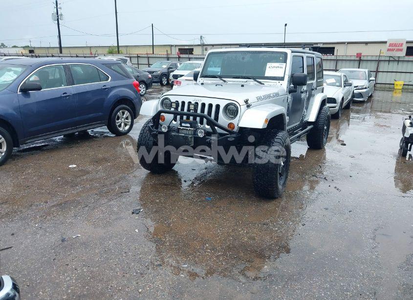 Photo 2 of 2012 Jeep Wrangler UNLIMITED RUBICON (VIN 1C4BJWFG7CL281844)
