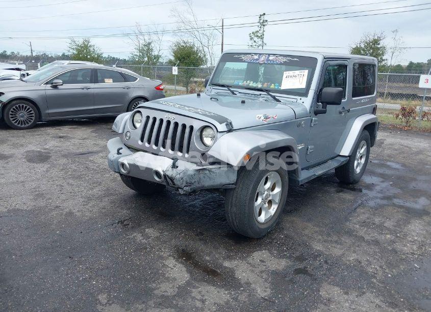 Photo 2 of 2014 Jeep Wrangler SAHARA (VIN 1C4GJWBG0EL180241)