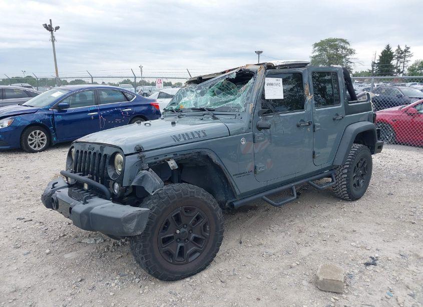 Photo 2 of 2015 Jeep Wrangler UNLIMITED WILLYS WHEELER (VIN 1C4HJWDG7FL672283)